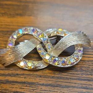 Aurora Crystal Infinity Brooch - Gold Tone